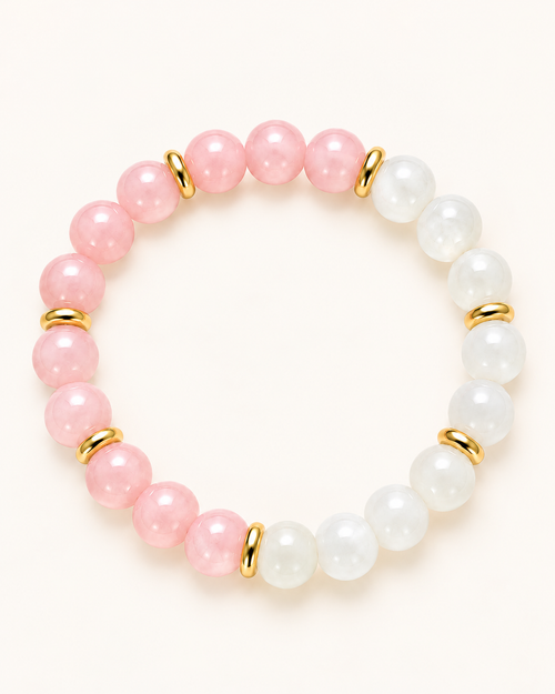 Amora Moonlit Blush Bracelet: pink and pale bead bracelet on an ivory background